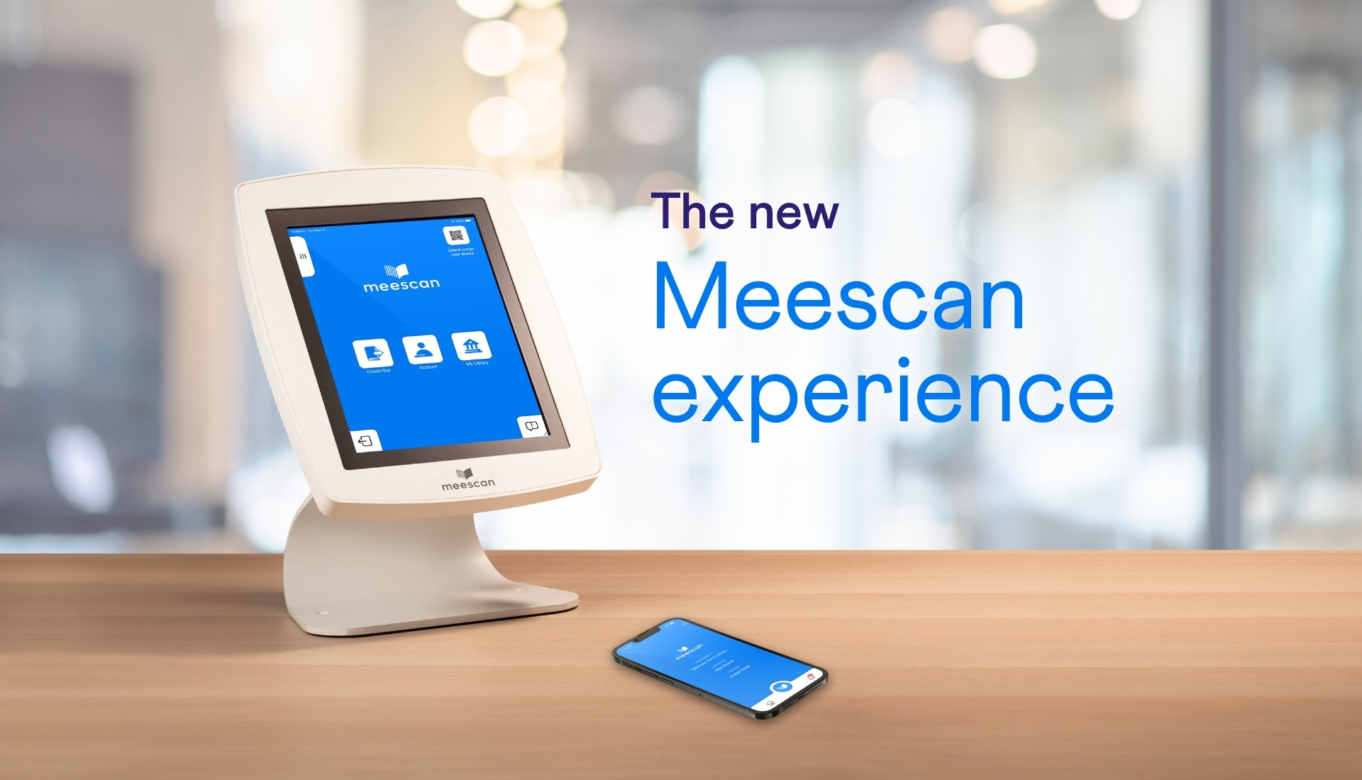 meescan kiosk and phone app on wooden table with text the new Meescan Experience.
